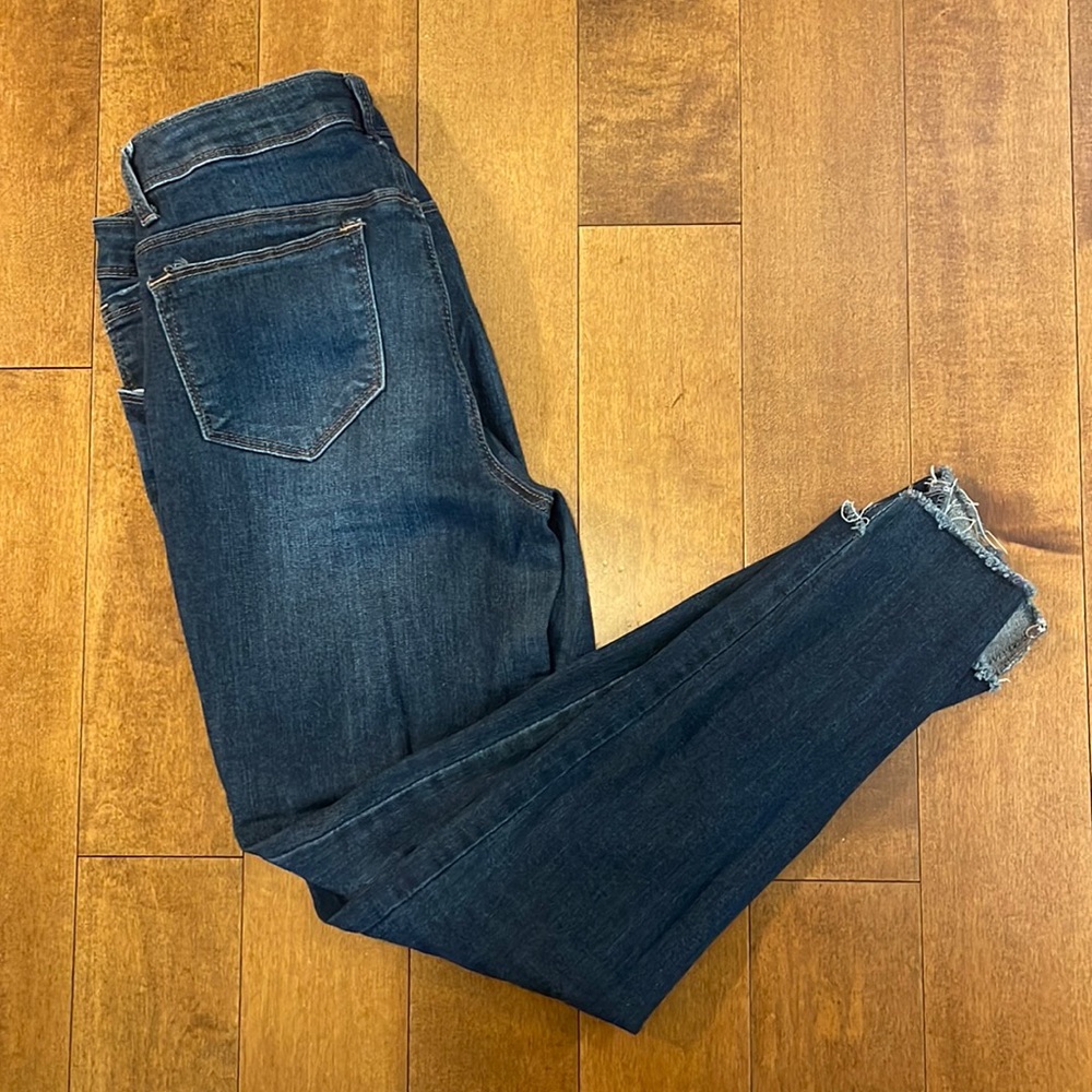 Dark wash jeans.